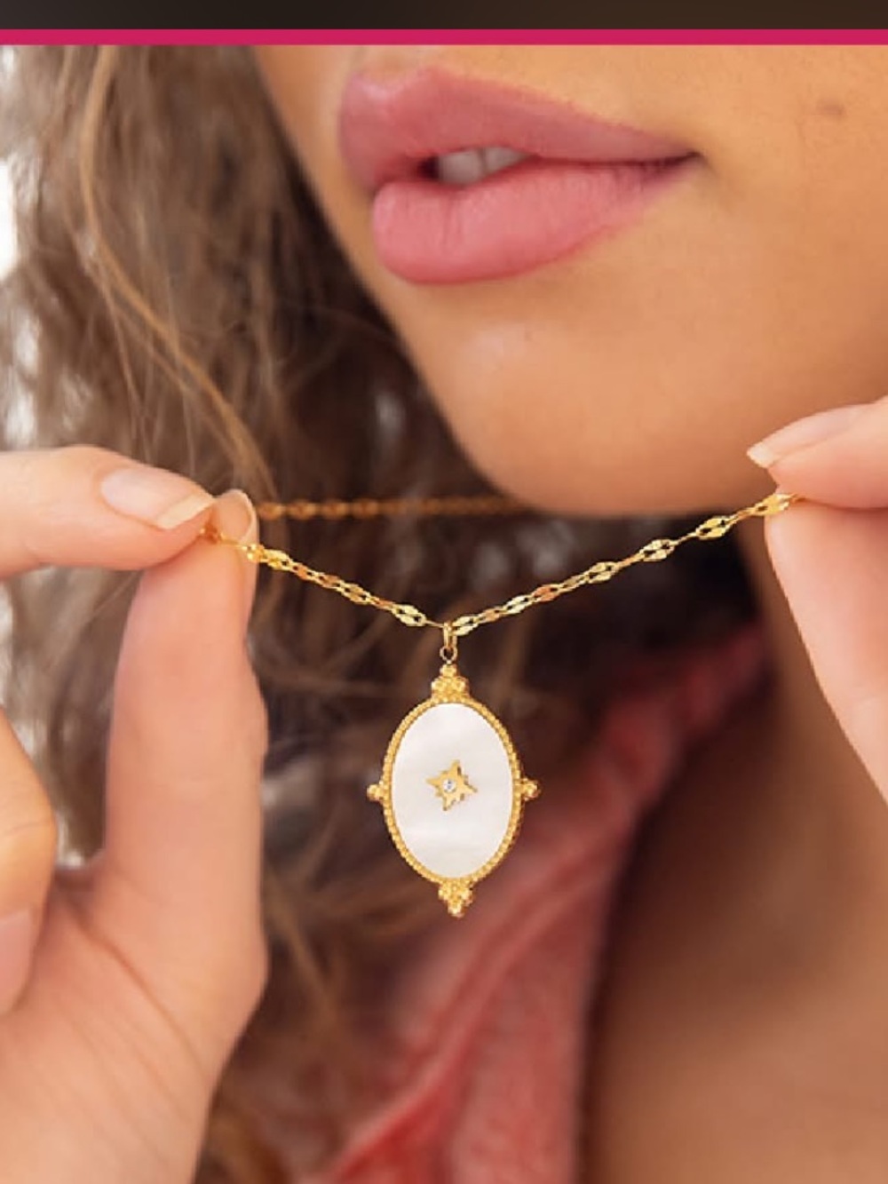 Eileen Necklace
Pearly white pendant with gold accents on gold link chain.